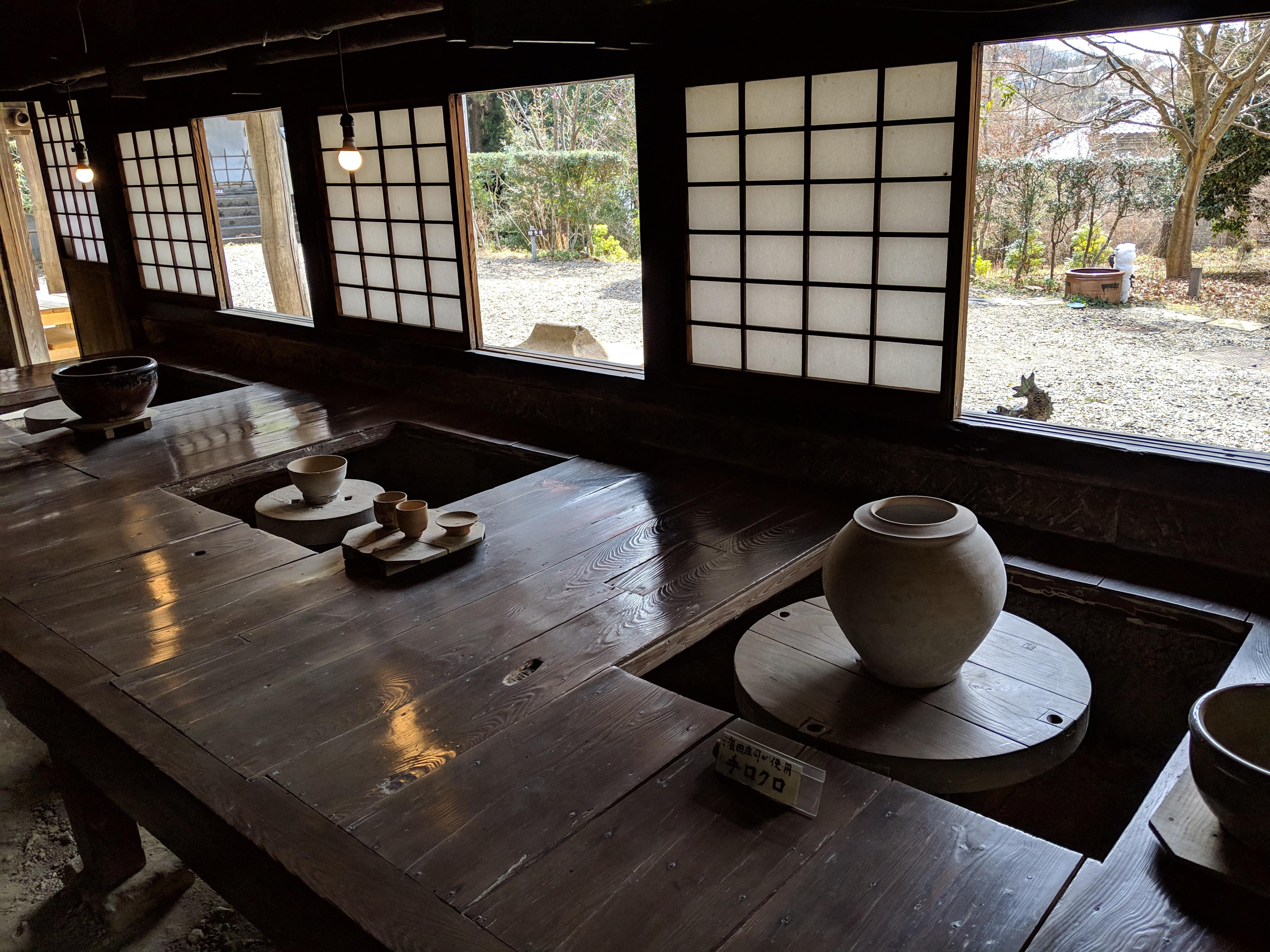 Japanese pottery studio with traditional shoji screens